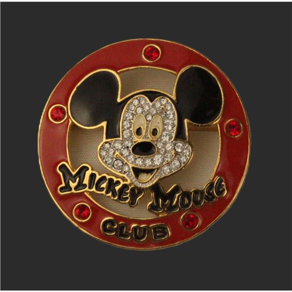 A Mickey Mouse Club Logo Swarovski Pin.