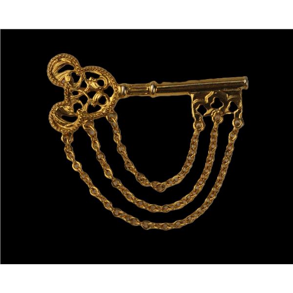 A Gold-toned Mickey Mouse Icon Key Pin.