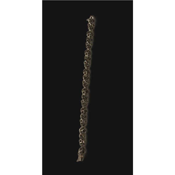 A Sterling Silver Peace, Love, and Mickey Mouse Tennis Bracelet.