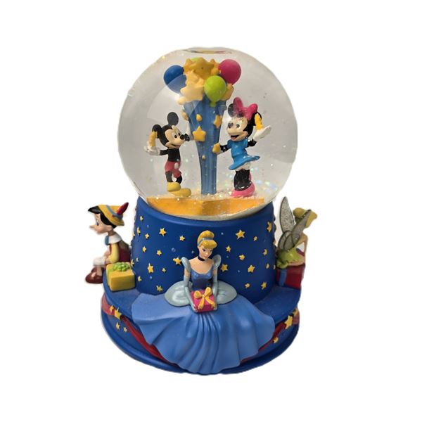 A Walt Disney 100 Years Celebration Snow Globe.