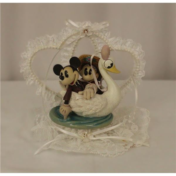 A Mickey and Minnie Mouse Wedding Cake Topper