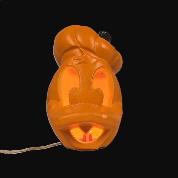 A Vintage Donald Duck Halloween Light-Up Pumpkin Jack-o'-Lantern.