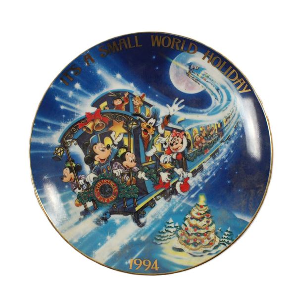 An "It's A Small World Holiday" Plate.