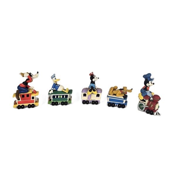A Miniature Five (5) Pieace Hallmark Disney Train Set