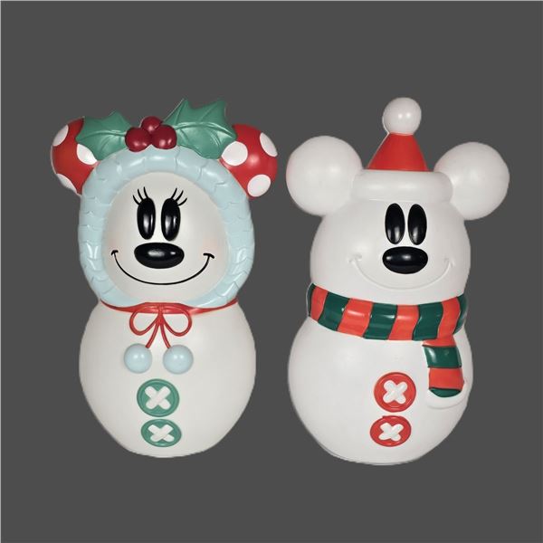 A Mickey and Minnie Mouse Light-up Snowman Blowmold Set.
