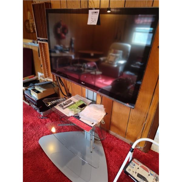 LRG LG FLAT SCREEN ON FLOOR STAND / WORKS