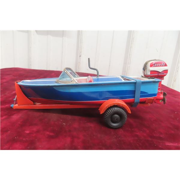 Haji Japan Tin Wind-Up Outboard Speed Boat on Trailer, 1960s–70s, 8"