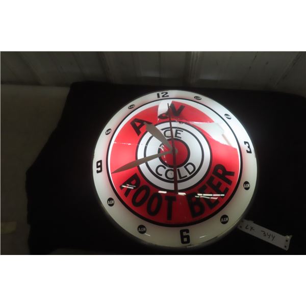 A&W Double Bubble Light-Up Vintage Working Clock, 15" Diameter. Glass lens is cracked and broken.