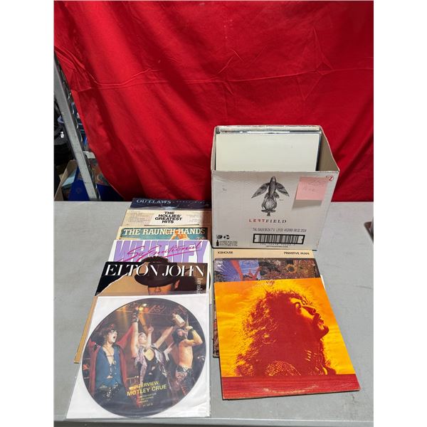 Assorted Vinyl Records: Elton John, Motley Crue, Santana, & More