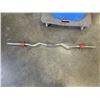 Image 2 : CURL AND TOTE OF WEIGHT PLATES
