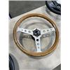 Image 4 : 3 RACING STEERING WHEELS AND WOODEN WHEEL