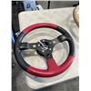 Image 5 : 3 RACING STEERING WHEELS AND WOODEN WHEEL