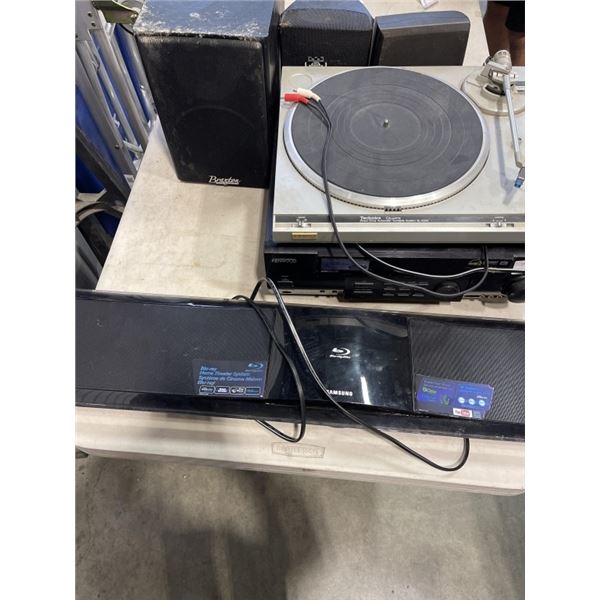 LOT OF SPEAKERS AND RECVIERS AND TURNTABLEAND BLUE RAY SOUNDBAR