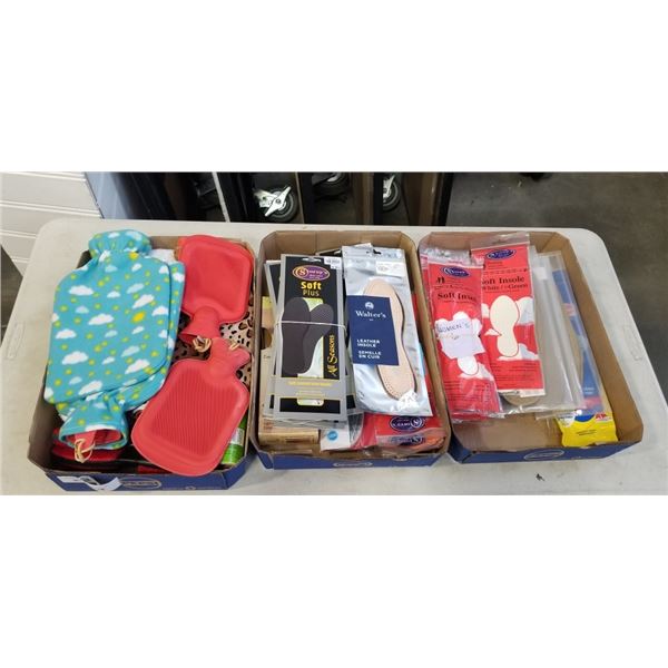 2 TRAYS OF FOOT INSOLES AND TRAY OF HOT WATER BOTTLES
