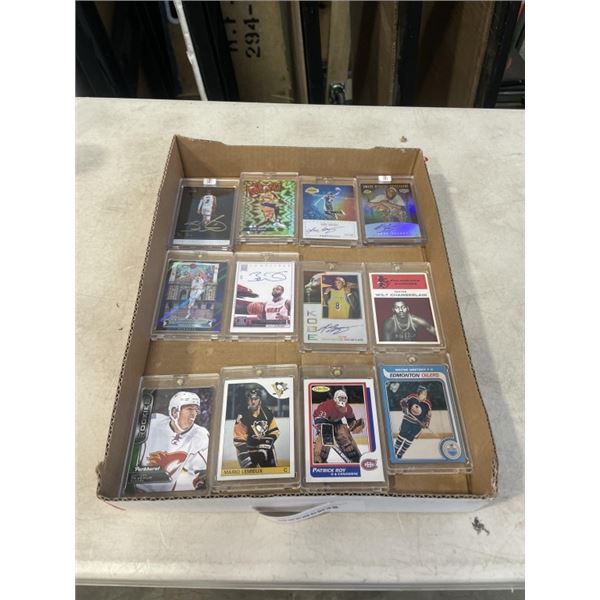 UNAUTHENTIC TRAY OF SPORTS CARDS