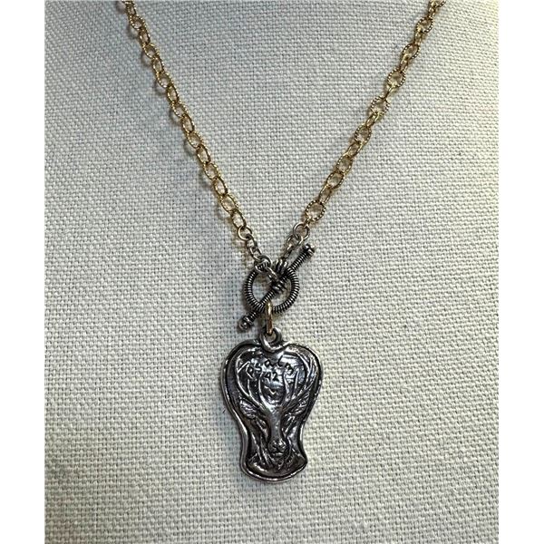 CINDY SWISHER: Gold and Silver Elk Pendant Necklace by Devoted Dove Jewelry
