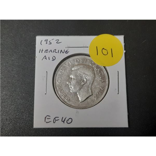 1952 Hearing Aid Canadian Silver 50 Cents. The Hearing Aid in the king’s ear is the result 