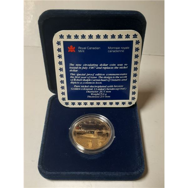 1987 Loonie Dollar. Canada’s first Proof Loonie. Ultra Heavy Cameo. Housed in its original 