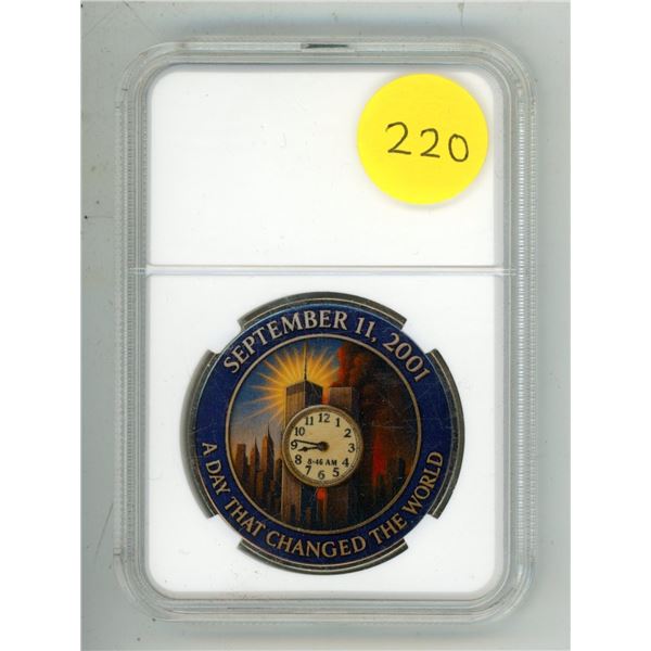 September 11, 2001 Twin Towers Colourized Memorial Medal. Housed in a hard plastic holder. BU.