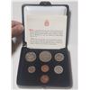 Image 1 : 1976 7-coin Custom Set with two 1 Cent Coins. Housed in its original RCM case with gold Canada Coat 