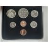 Image 2 : 1976 7-coin Custom Set with two 1 Cent Coins. Housed in its original RCM case with gold Canada Coat 