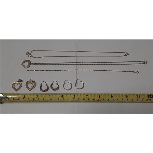 (2) Necklace - Marked 10 K.T., (1) Bracelet Market 10 K.T., (3) Pair of Earings. (Doesn’t M