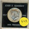 Image 1 : 1964 United States Kennedy half dollar, a collectible coin produced to honor President John F. Kenne