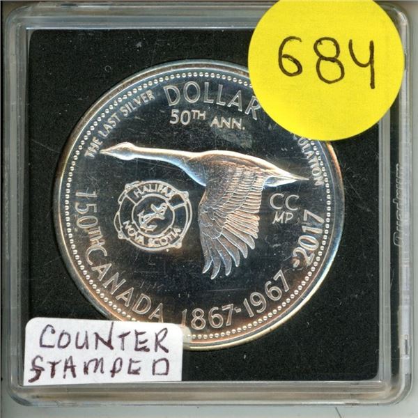 1967 Canadian Confederation Centennial silver dollar that has been privately counter-stamped for the