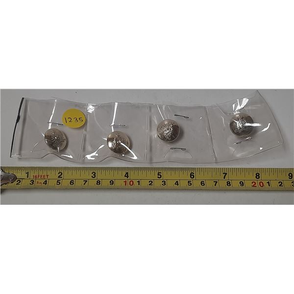 Set of 4 RCMP buttons.