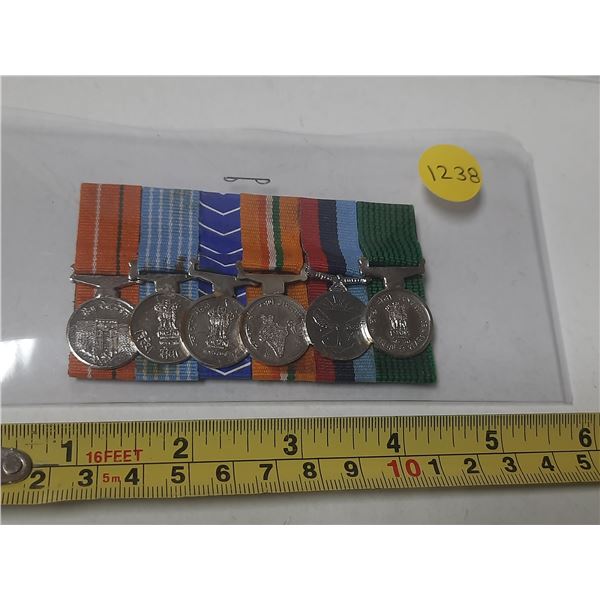 Set of 6 miniature medals from India.