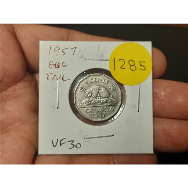 1957 Bug Tail Nickel 5 Cents. There is a small Die Chip on the end of the beaver’s tail tha