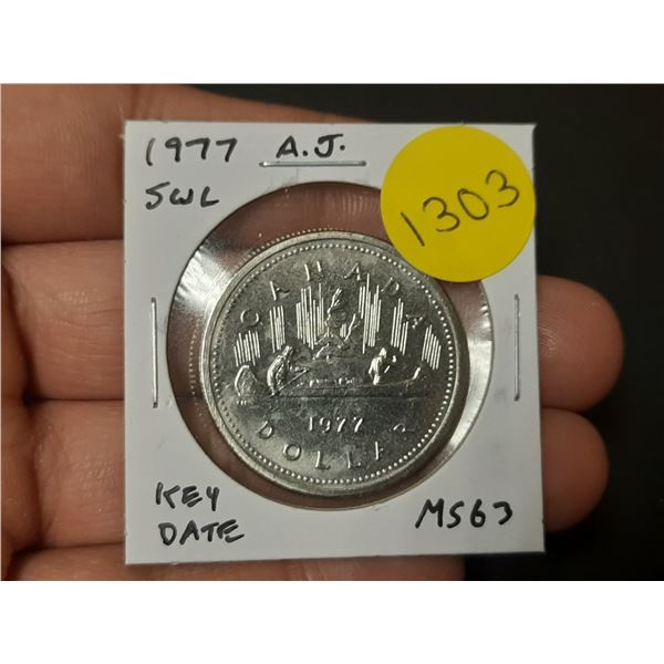 1977 Attached Jewel Short Water Lines Nickel Dollar. Key Date. MS63.