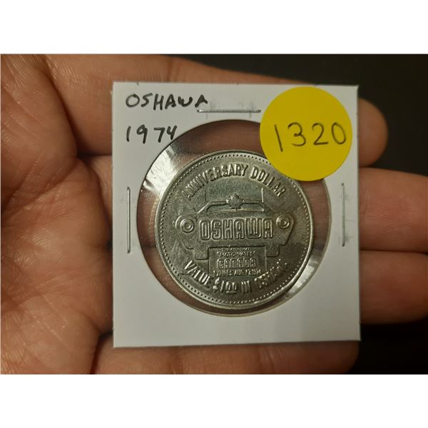 1974 Oshawa Ontario Trade Dollar celebrating car manufacturing in Canada. Unc.