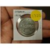 Image 1 : 1974 Oshawa Ontario Trade Dollar celebrating car manufacturing in Canada. Unc.