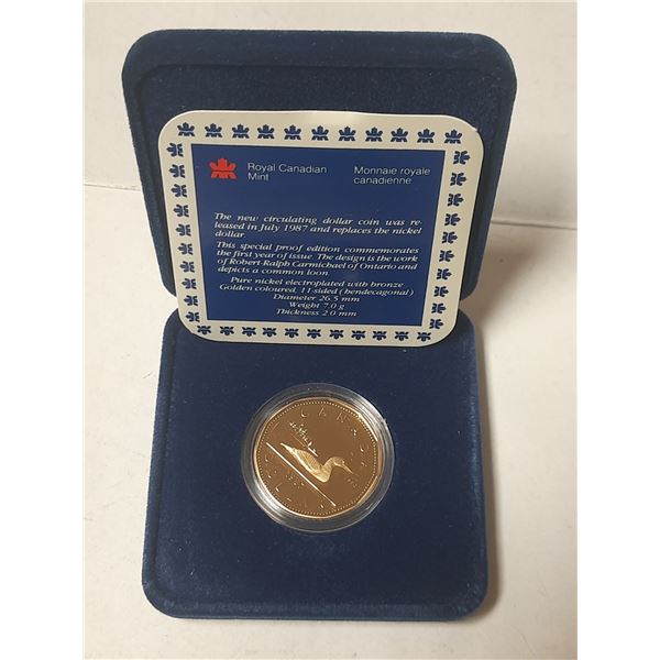 1987 Proof Loonie Dollar. The first year of the Loonie. Ultra Heavy Cameo. Housed in its original RC