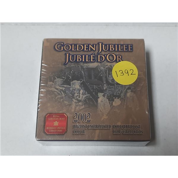 2002 Queen Elizabeth Golden Jubilee Silver Dollar. Brilliant Uncirculated. Housed in its original an