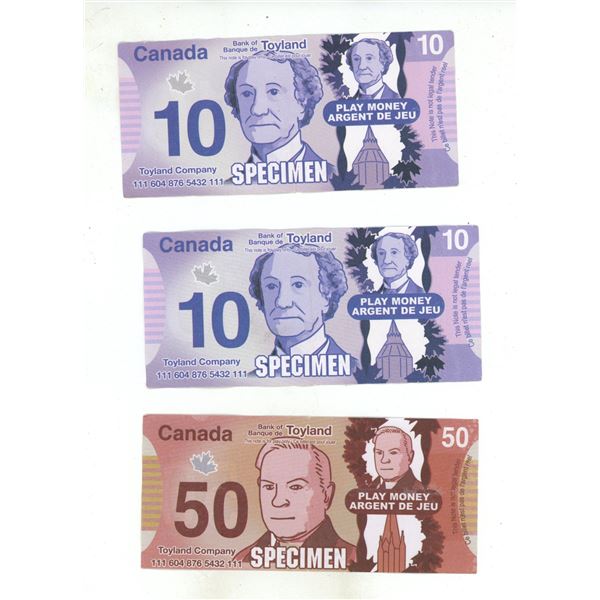 (2) Canadian Two Dollar and (1) 50 Dollar Toyland Play Money.