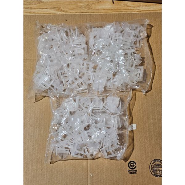 New 3 packages of 100 Christmas light hangers
