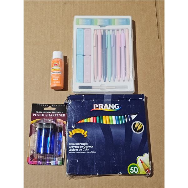 New case of pens with leads and erasers and coloring pencils with sharpener