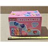 Image 1 : Large box of valentine heart shaped erasers variety of colours