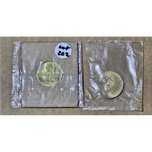 2002 Coca Cola Olympic hockey token and 1967 Confederation coin in original packaging