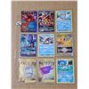 Image 1 : Sheet of nine Pokemon Holo cards and misc.