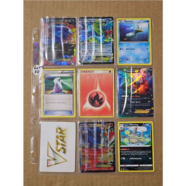 Sheet of nine Pokemon Holo cards and misc.