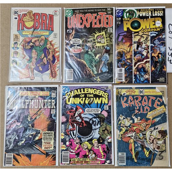 Six DC Comics in bags with backboards