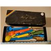 Image 1 : Vintage Pot of Gold box filled with plastic cutlery, knives, knife sharpener