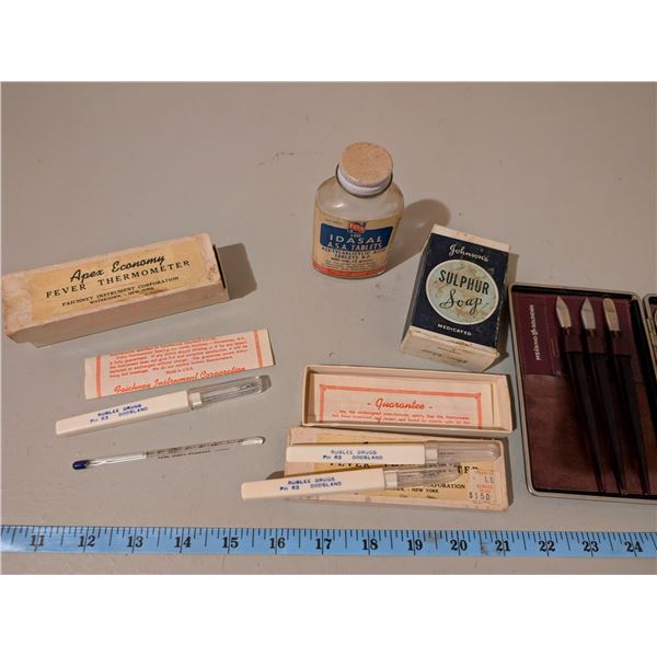 Thermometers, manicure set, medicine bottle