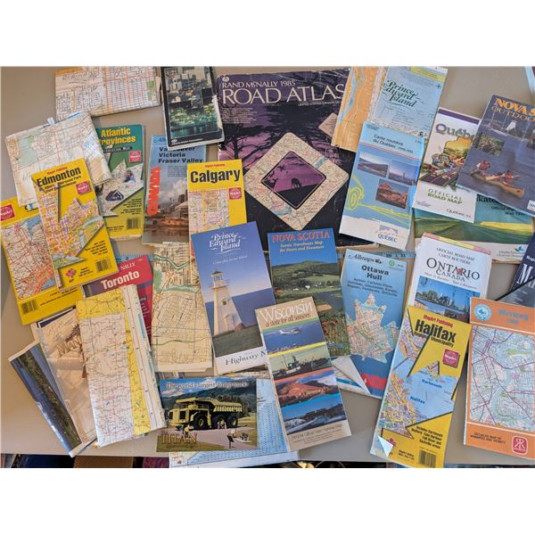 Collection of 30 Canadian road maps, McNally Road Atlas, magnifier