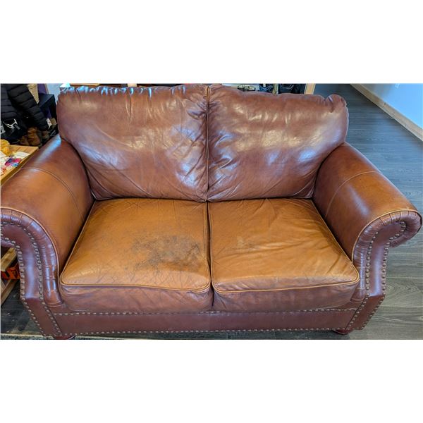 Brown Leather Loveseat with rivets - wear on one cushion seat and back top cushion. Cleans well, smo