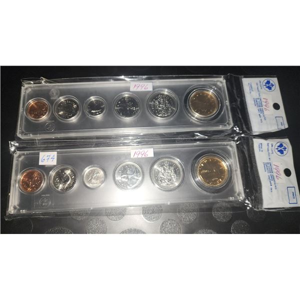 Two 1996 Six Coin Sets in Hard Plastic Cases