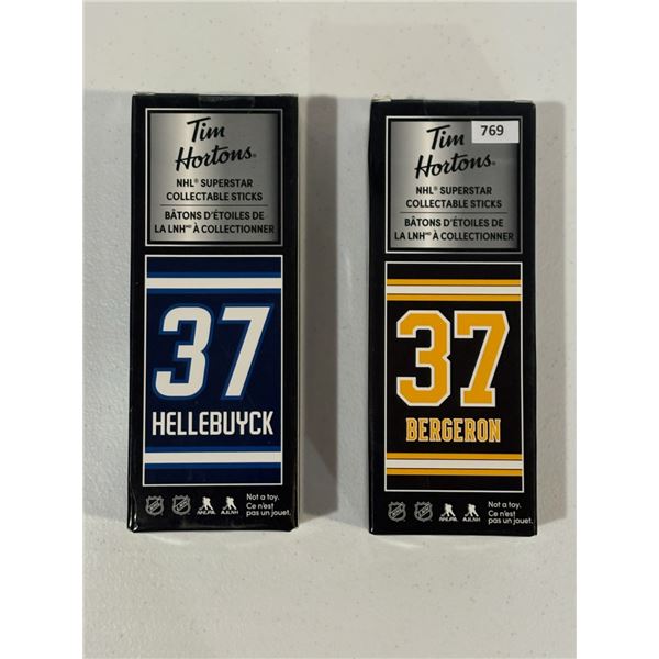Hellebuyck / Bergeron - Mini Replica Hockey Sticks
